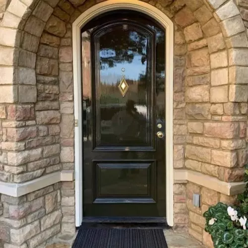 photo of front door painted black with high gloss paint