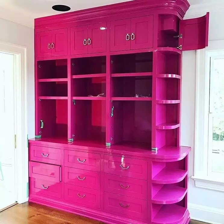 photo of a furniture cabinet painted with pink high gloss paint