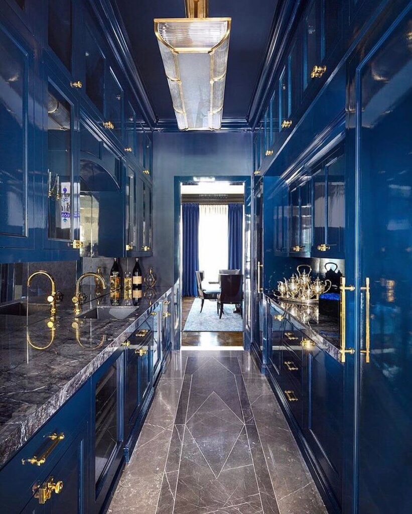 2020-08-17_CD_yCMbJzKe_2377839181379875486 photo of kitchen space painted blue with high gloss paint