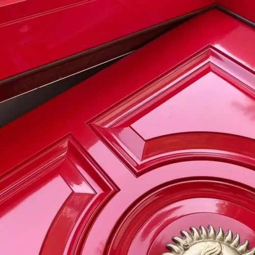 photo of high shine red paint on door