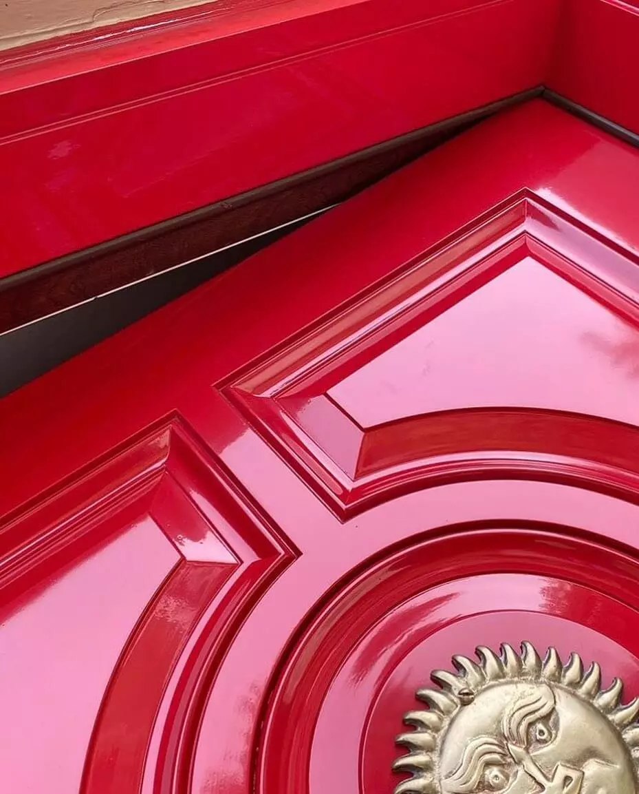 photo of high shine red paint on door