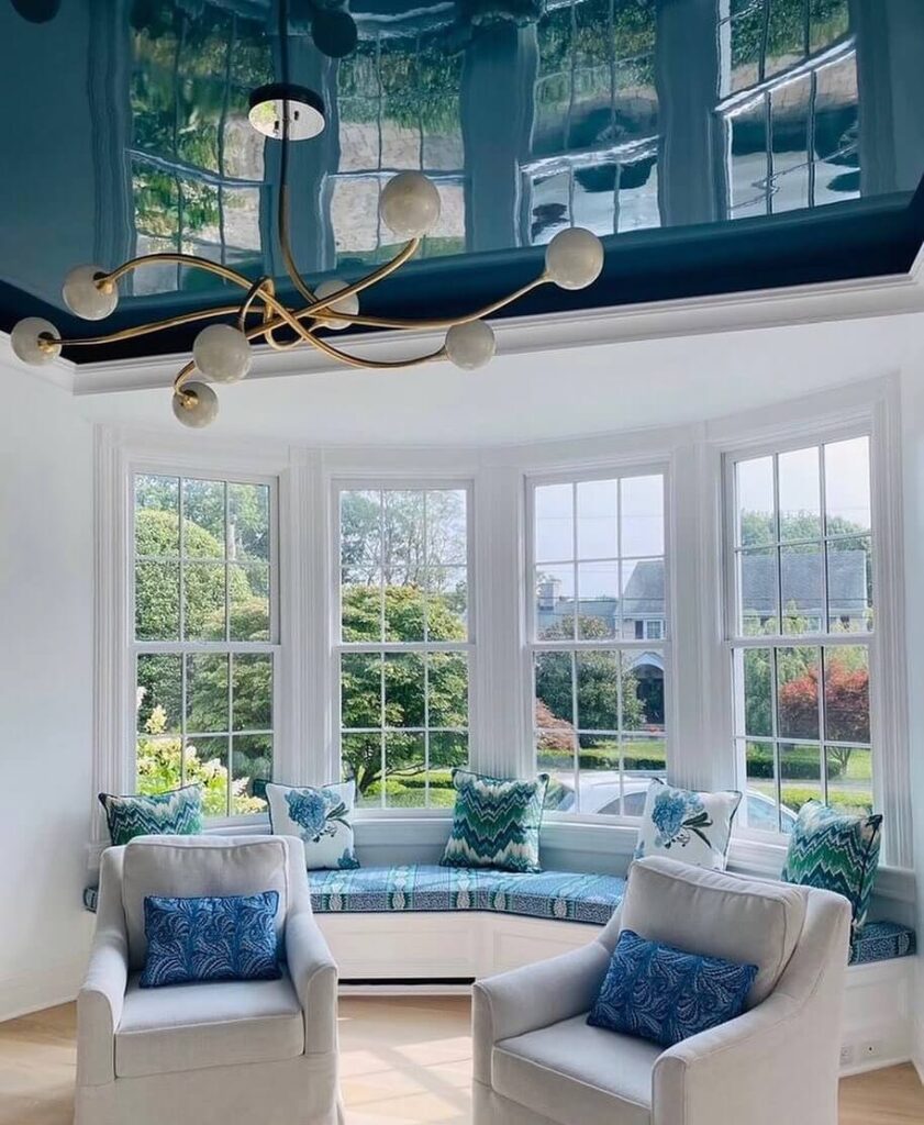 2020-11-23_CH7rJIZpvMF_2448740565901570821 photo of living room with ceiling painted teal in high gloss paint.