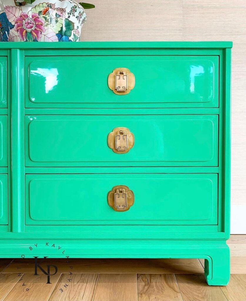 2021-01-04_CJnx0OzMhVf_2479169213473887583 photo of dresser painted bright green with high gloss paint