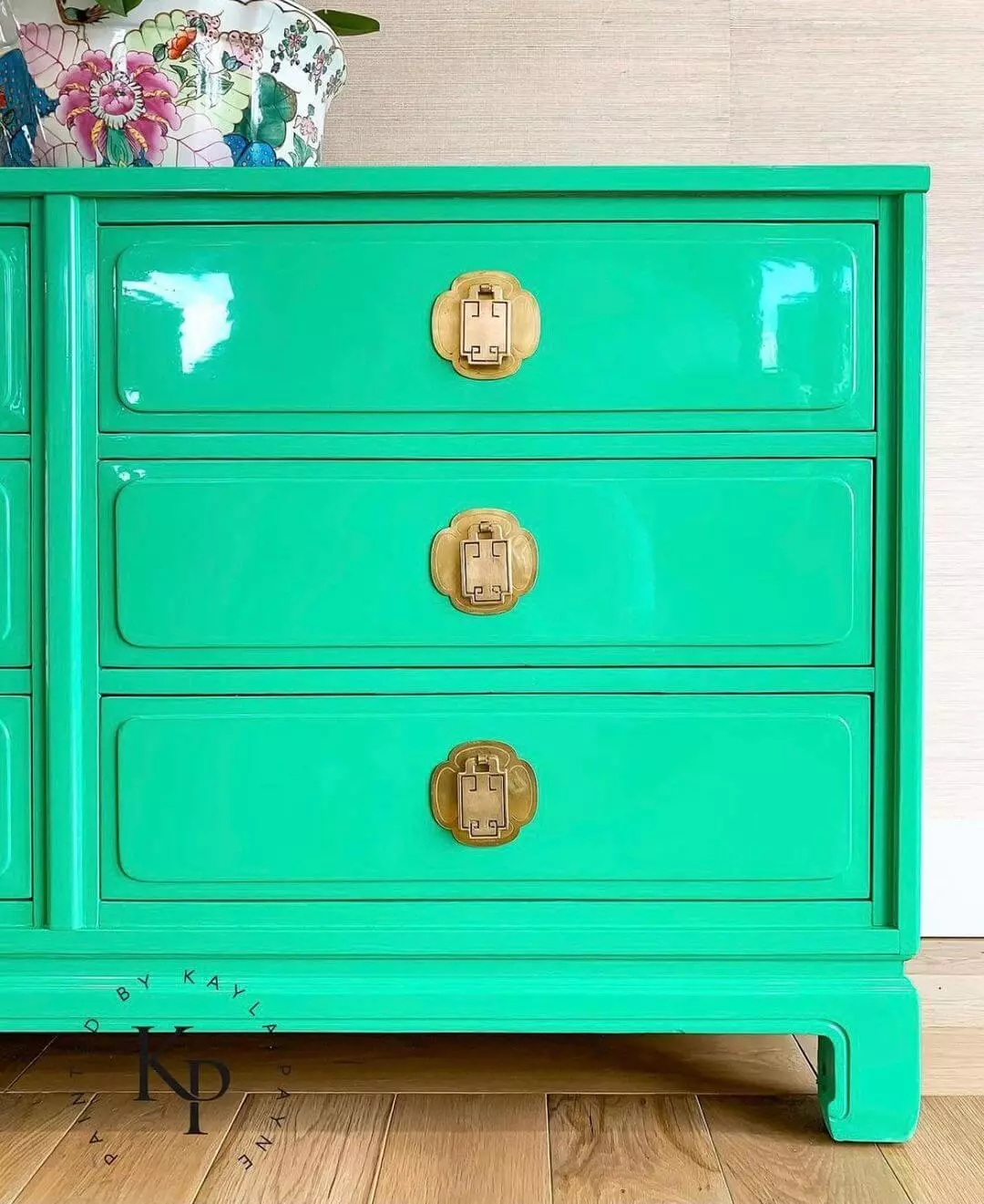photo of dresser painted bright green with high gloss paint