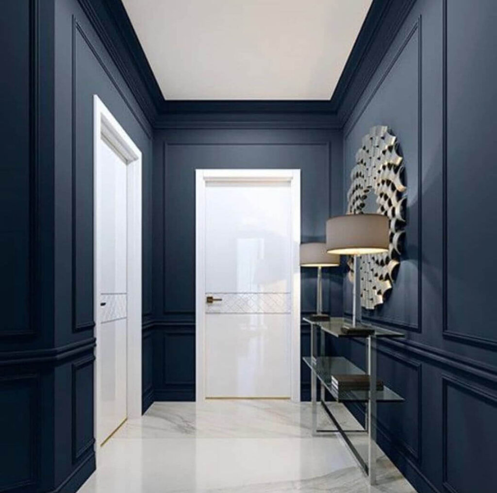 2021-01-16_CKG8OdtMgmn_2487940720928885159 photo of hallway painted dark blue with fine paints products.