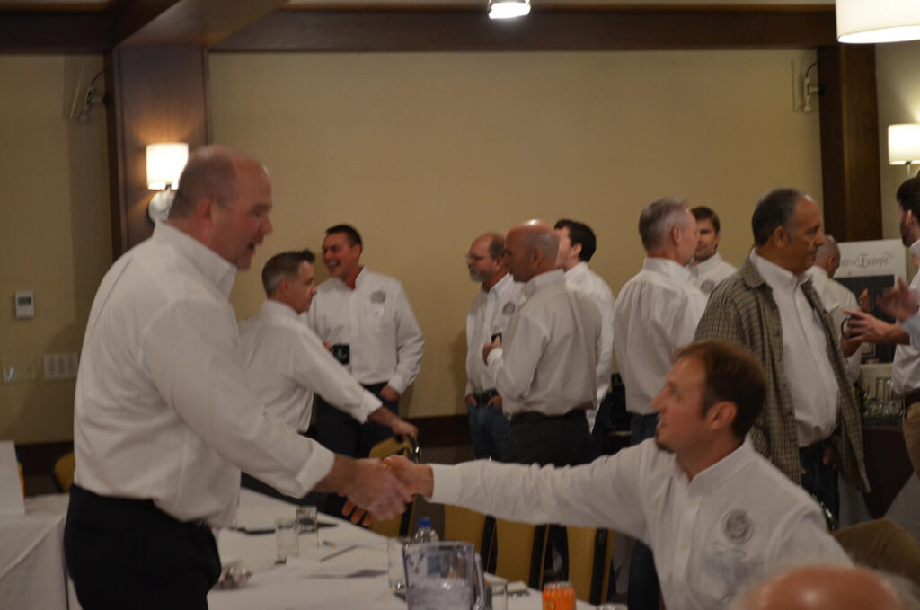 john_handshake Fine Paints of Europe annual meeting